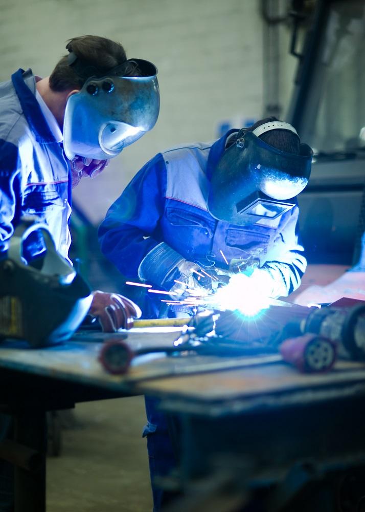 A welder learns gas metal arc welding.