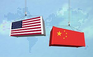 trip hammer blacksmith USA and China import export trade war concept. Cargo containers collision as USA and China business finance economic trade tension conflict and trade deficit symbol