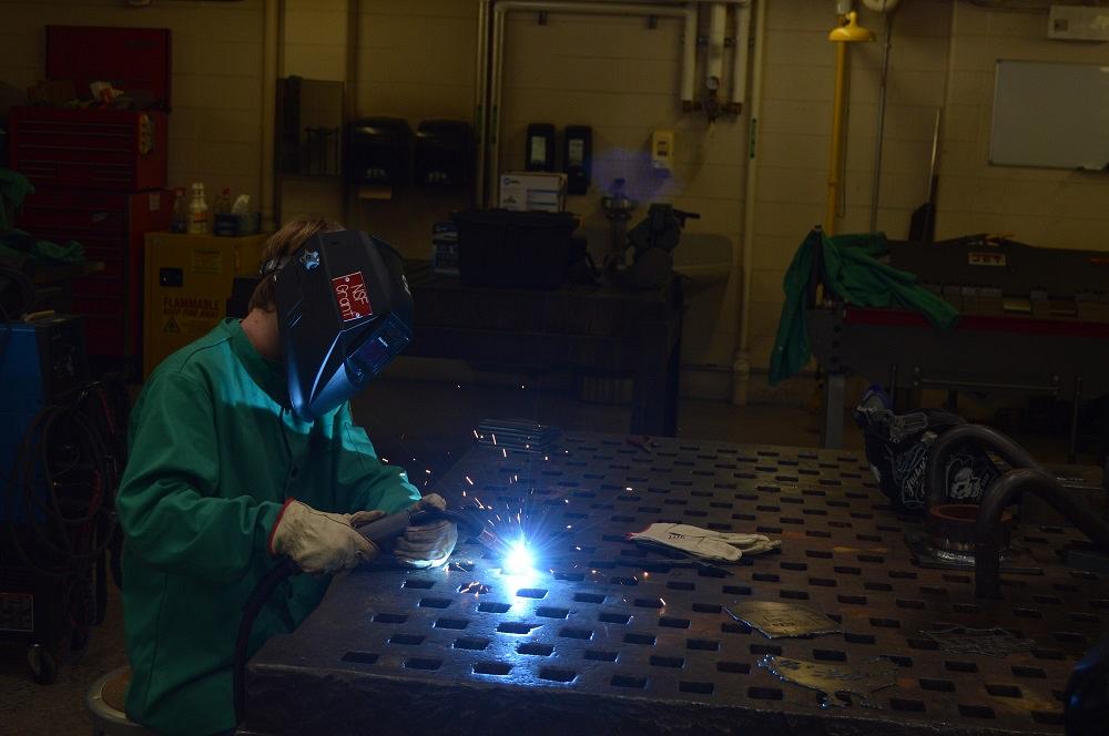 welding at a summer manufacturing camp