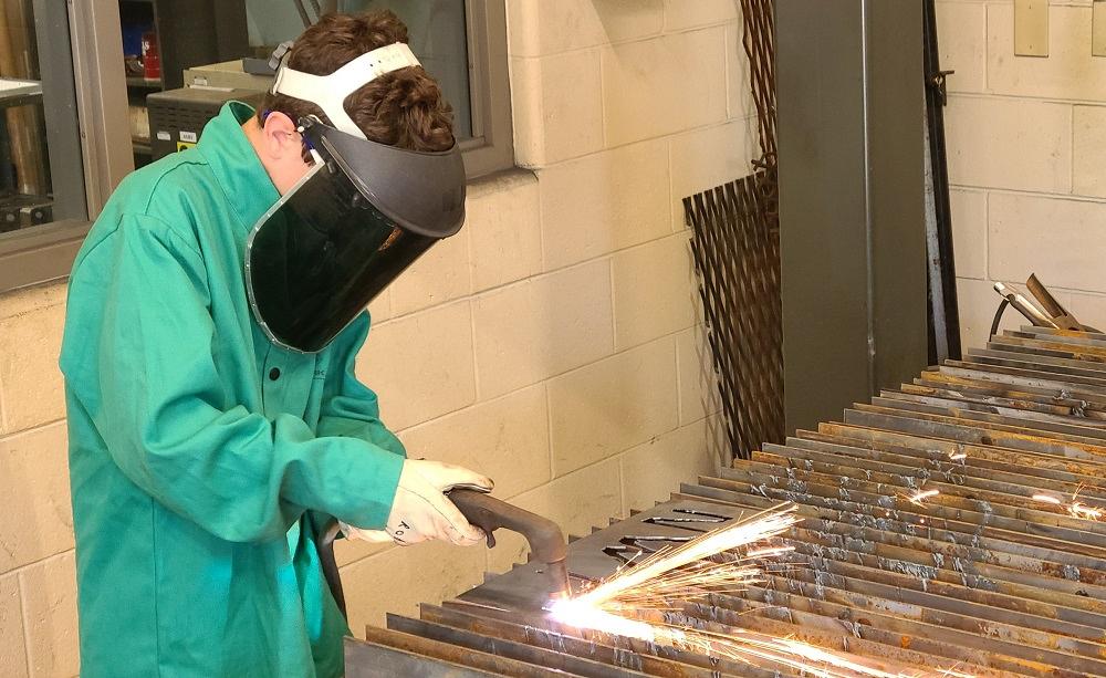 welding at a summer manufacturing camp