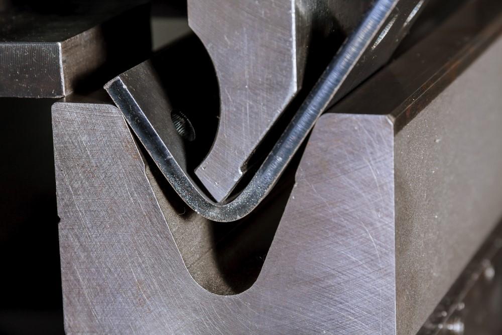 Metal part bending on a small press brake