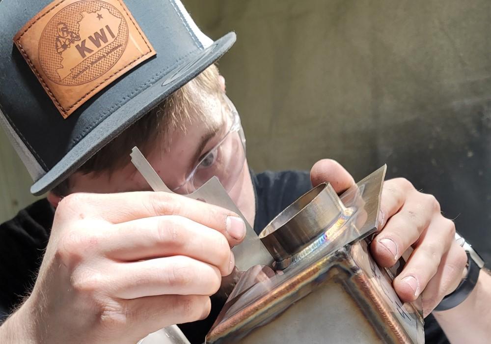 Wyatt Hansen inspects a pressure vessel. 